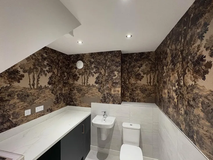 Front door with windows either side